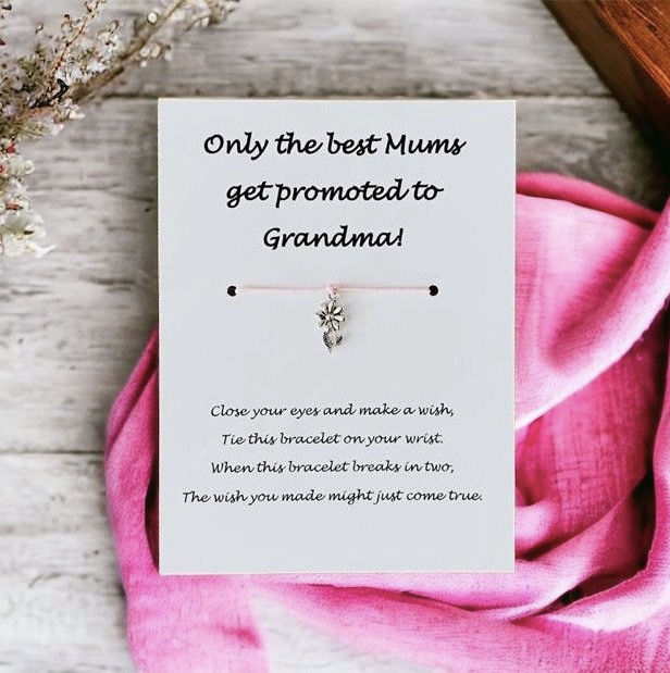 A small bracelet reads 'Only the best Mums get promoted to Grandmas'