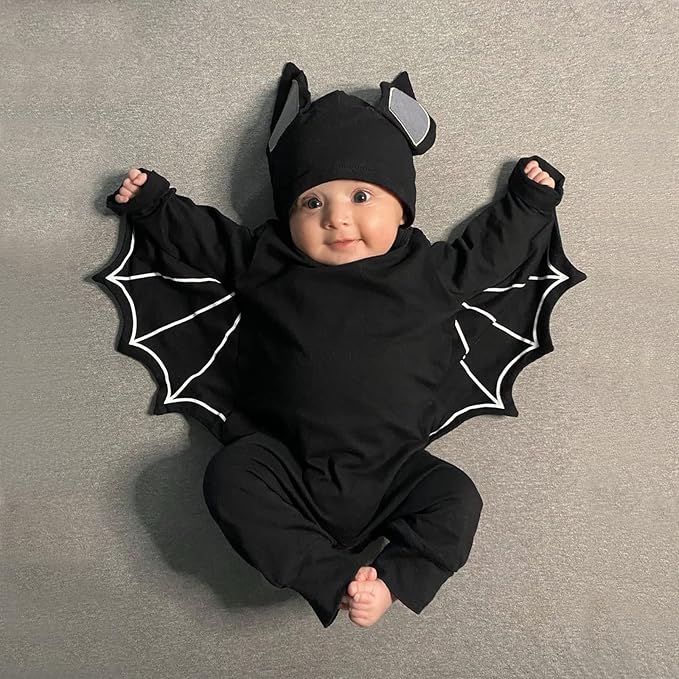 A baby in a halloween bat outfit