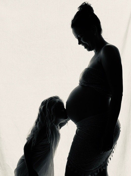 Giving Birth Abroad: From Uncertainty To Confidence For English Speakers In Spain 2 Pregnant Malaga kiss on belly Titia