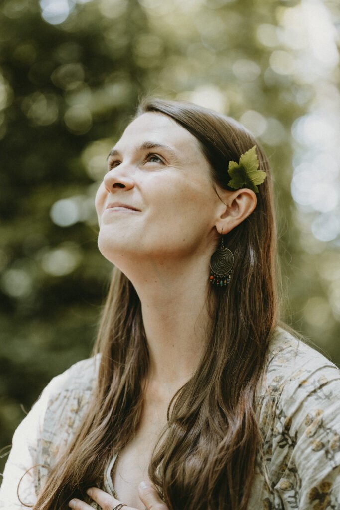 One Positive Birth Story (and how it changed everything) Nicole Harwood of The Grounded Mama looks up to the trees whilst discussing one positive birth story that changed her life.